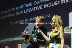 Jamie O’Neill, The Albion Knitting Co with host Juliet Mann. Awards for Excellence 2025. Photo by Callum Staley (CJS Photography)