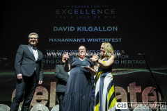 Manannan’s Winterfest winners of The King William’s College & The Buchan School Award for Nurturing our Arts, Culture and Heritage. Presented by Damian Henderson, King William’s College & The Buchan School and host Juliet Mann.  Awards for Excellence 2025. Photo by Callum Staley (CJS Photography)