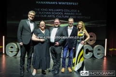 Manannan’s Winterfest winners of The King William’s College & The Buchan School Award for Nurturing our Arts, Culture and Heritage. Presented by Damian Henderson, King William’s College & The Buchan School and host Juliet Mann.  Awards for Excellence 2025. Photo by Callum Staley (CJS Photography)