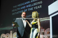 Gary Whipp, Medicann with host Juliet Mann. Awards for Excellence 2025. Photo by Callum Staley (CJS Photography)