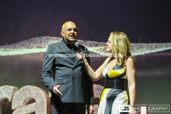 Neeraj Bari, OPUL with host Juliet Mann. Awards for Excellence 2025. Photo by Callum Staley (CJS Photography)