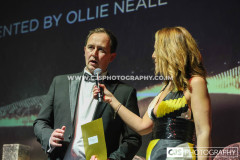 Ollie Kneale, Okell’s with host Juliet Mann. Awards for Excellence 2025. Photo by Callum Staley (CJS Photography)