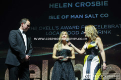Isle of Man Salt Co winners of The Okell’s Award for Celebrating Local Food and Drink. Presented by Ollie Kneale, Okell’s. Awards for Excellence 2025 and host Juliet Mann.  Photo by Callum Staley (CJS Photography)