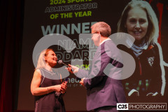 Niamh Goddard (Hockey), Sports Administrator of the Year Winner with host James Davis. Isle of Man Sports Awards 2024. Photo by Callum Staley (CJS Photography)