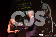 Niamh Goddard (Hockey), Sports Administrator of the Year Winner with host James Davis. Isle of Man Sports Awards 2024. Photo by Callum Staley (CJS Photography)