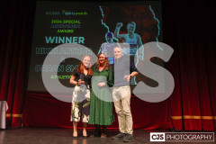 Education minister Daphne Caine presenting Nikki Arthur and Orran Smith with the Special Achievement Award. Isle of Man Sports Awards 2024. Photo by Callum Staley (CJS Photography)