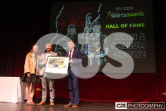 Georgia Taylor-Brown MBE (Great Britain Olympian, and former world champion, triathlete) presenting Callum & Ryan Crowe with their Hall of Fame Photograph. Isle of Man Sports Awards 2024. Photo by Callum Staley (CJS Photography)