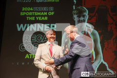 Regan Corrin (Athletics), Under-21 Sportsman of the Year with host James Davis. Isle of Man Sports Awards 2024. Photo by Callum Staley (CJS Photography)