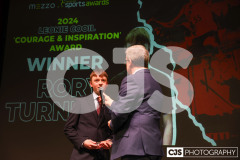 Rory Turner recipient of the Leonie Cooil Courage and Inspiration Award with host James Davis. Isle of Man Sports Awards 2024. Photo by Callum Staley (CJS Photography)