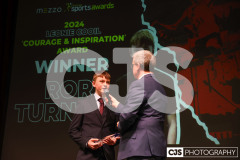 Rory Turner recipient of the Leonie Cooil Courage and Inspiration Award with host James Davis. Isle of Man Sports Awards 2024. Photo by Callum Staley (CJS Photography)