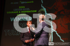 Rory Turner recipient of the Leonie Cooil Courage and Inspiration Award with host James Davis. Isle of Man Sports Awards 2024. Photo by Callum Staley (CJS Photography)