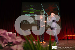 Rory Turner recipient of the Leonie Cooil Courage and Inspiration Award with host James Davis. Isle of Man Sports Awards 2024. Photo by Callum Staley (CJS Photography)