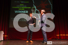 Rory Turner recipient of the Leonie Cooil Courage and Inspiration Award with host James Davis. Isle of Man Sports Awards 2024. Photo by Callum Staley (CJS Photography)