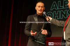 Achievement In The Isle of Man Award winner Albert Johnson (Athletics) with host Rob Pritchard. Isle of Man Sports Awards 2025. Photo by Callum Staley (CJS Photography)