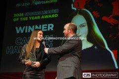 Sure Sports Leader of the Year to Caitlyn Hampson with host Rob Pritchard. Isle of Man Sports Awards 2025. Photo by Callum Staley (CJS Photography)