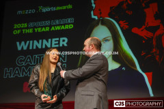 Sure Sports Leader of the Year to Caitlyn Hampson with host Rob Pritchard. Isle of Man Sports Awards 2025. Photo by Callum Staley (CJS Photography)