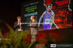 Newfield Under 21 Sportsman of the Year Regan Corrin (Athletics) with host Rob Pritchard. Isle of Man Sports Awards 2025. Photo by Callum Staley (CJS Photography)