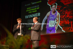 Newfield Under 21 Sportsman of the Year Regan Corrin (Athletics) with host Rob Pritchard. Isle of Man Sports Awards 2025. Photo by Callum Staley (CJS Photography)