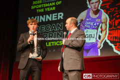 Newfield Under 21 Sportsman of the Year Regan Corrin (Athletics) with host Rob Pritchard. Isle of Man Sports Awards 2025. Photo by Callum Staley (CJS Photography)