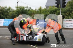 Blackford’s Pre-TT Classic Road Races, Race 4 3 Wheeling Sidecar Classic Race 1. Castletown Corner. Photo by Callum Staley (CJS Photography)