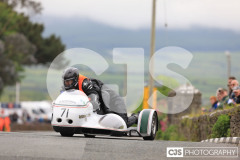 Blackford’s Pre-TT Classic Road Races, Race 4 3 Wheeling Sidecar Classic Race 1. Castletown Corner. Photo by Callum Staley (CJS Photography)